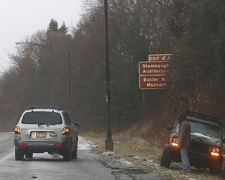 A two car minor accident sits on the shoulder of 680 South, Friday, Jan. 12, 2018, in Youngstown...(Nikos Frazier | The Vindicator)