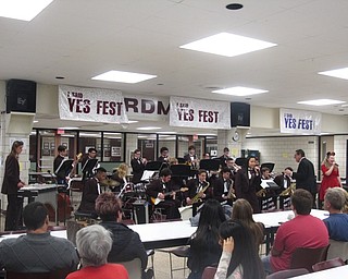 Neighbors | Zack Shively.The jazz band performed in the cafeteria during the intermission of the celebration in the BPAC. The cafeteria also had visual arts from students in all grades from the Boardman schools.