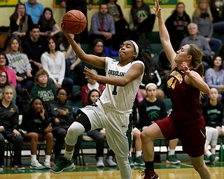 Ursuline's Dayshonette Harris (1) goes up for a layup past Cardinal Mooney Caitlin Perry (44) in the third quarter of an OSHAA basketball game, Thursday, Feb. 1, 2018, in Youngstown. Ursuline won 76-54...(Nikos Frazier | The Vindicator)