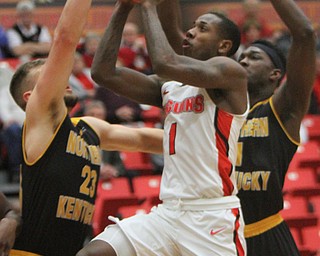 WilliamD. Lewis The Vindicator YSU's Braun Hartfield(1) shoots around NKU's Carson Williams(23) andJordan Garnett(1) during 2-1-18 action at YSU.