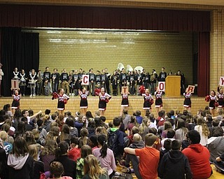 Neighbors | Abby Slanker.Accompanied by the Canfield Village Middle School pep band, the seventh- and eighth-grade cheerleaders led the V-I-C-T-O-R-Y cheer at the school’s annual Winter Sports Pep Assembly on Jan. 26.