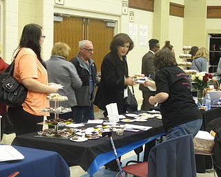 Neighbors | Zack Shively.Austintown Middle School hosted the third annual Jazz and Dessert night in their cafetorium on Jan. 27. The night included performances by the middle school, high school and alumni jazz bands as well as desserts from a number of amatuer and professional bakers.