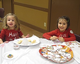 Neighbors | Zack Shively.Boardman Park gave the children a box to take their cookies home in. The families could color and put stickers on the box. Pictured are, from left, Skylar Drennen and Sophia Isaacs.