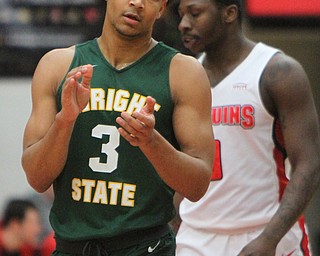 William D. Lewis The Vindicator WSU's Mark Hughes(3) reacts during 2-3-18 action at YSU.