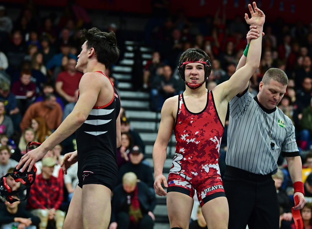 AUSTINTOWN, OHIO - FEBRUARY 3, 2018: Beaver Local's Skyler Lasure has his arm raised after defeating Jefferson's Joshua Baitt in their 132lb EOWL Championship bout, Saturday night at Austintown Fitch High School. DAVID DERMER | THE VINDICATOR