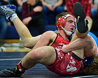 AUSTINTOWN, OHIO - FEBRUARY 3, 2018: Beaver Local's Beau Smith attempts to break free from the control of Louisville's Jax Leonard during their 145lb EOWL Championship bout, Saturday night at Austintown Fitch High School. DAVID DERMER | THE VINDICATOR