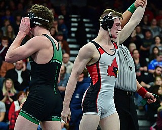 AUSTINTOWN, OHIO - FEBRUARY 3, 2018: Canfield's David Reinhart has his arm raised after defeating West Branch's Dylan Miller in their 152lb EOWL Championship bout, Saturday night at Austintown Fitch High School. DAVID DERMER | THE VINDICATOR