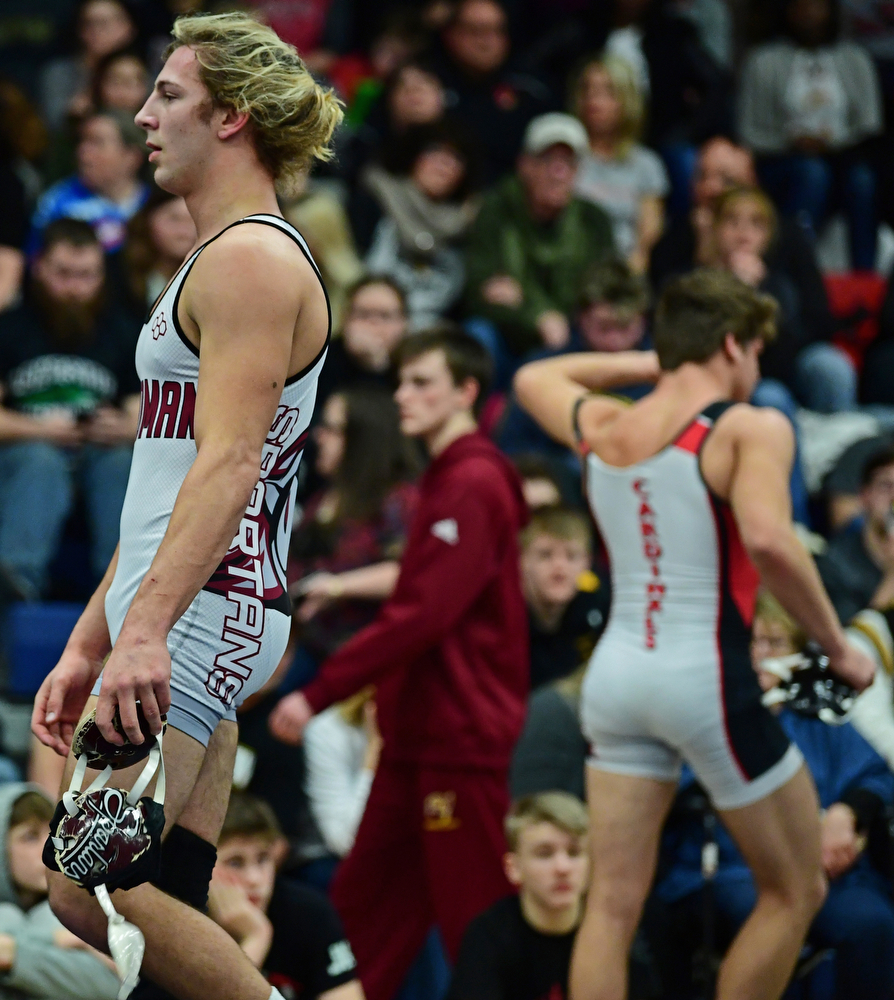 AUSTINTOWN, OHIO - FEBRUARY 3, 2018: Boardman's Michael O'Horo walks off the mat in frustration after Canfield's Anthony D'Alesio sustained an injury preventing the bout from continuing after their 170lb EOWL Championship bout, Saturday night at Austintown Fitch High School. DAVID DERMER | THE VINDICATOR