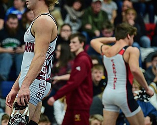 AUSTINTOWN, OHIO - FEBRUARY 3, 2018: Boardman's Michael O'Horo walks off the mat in frustration after Canfield's Anthony D'Alesio sustained an injury preventing the bout from continuing after their 170lb EOWL Championship bout, Saturday night at Austintown Fitch High School. DAVID DERMER | THE VINDICATOR