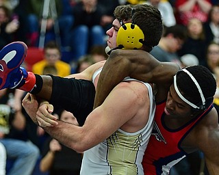 AUSTINTOWN, OHIO - FEBRUARY 3, 2018: Crestview's Landon Talbert controls the leg of Fitch's Breylon Douglas during their 195lb EOWL Championship bout, Saturday night at Austintown Fitch High School. DAVID DERMER | THE VINDICATOR