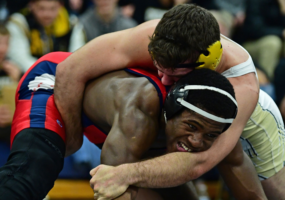 AUSTINTOWN, OHIO - FEBRUARY 3, 2018: Fitch's Breylon Douglas attempts to break free from Crestview's Landon Talbert during their 195lb EOWL Championship bout, Saturday night at Austintown Fitch High School. DAVID DERMER | THE VINDICATOR