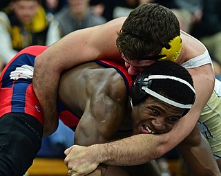 AUSTINTOWN, OHIO - FEBRUARY 3, 2018: Fitch's Breylon Douglas attempts to break free from Crestview's Landon Talbert during their 195lb EOWL Championship bout, Saturday night at Austintown Fitch High School. DAVID DERMER | THE VINDICATOR