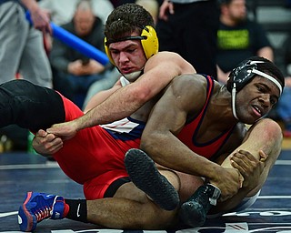 AUSTINTOWN, OHIO - FEBRUARY 3, 2018: Fitch's Breylon Douglas attempts to break free from Crestview's Landon Talbert during their 195lb EOWL Championship bout, Saturday night at Austintown Fitch High School. DAVID DERMER | THE VINDICATOR