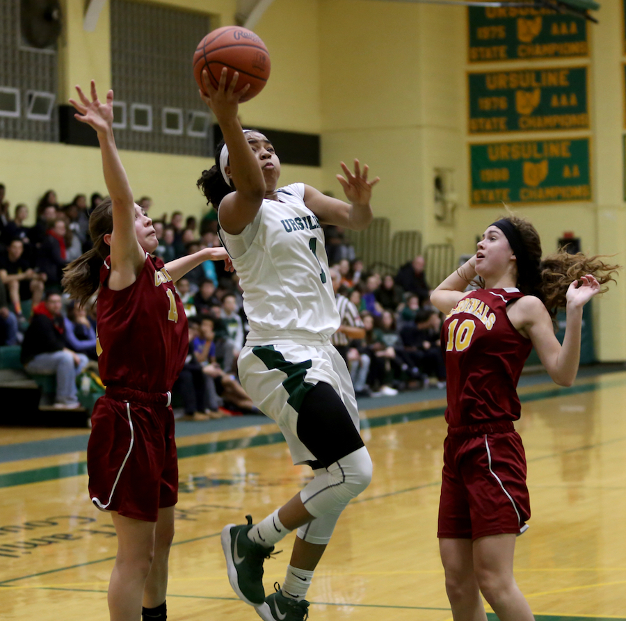 Ursuline's Dayshonette Harris (1) goes up for a layup in the second quarter of an OSHAA basketball game, Thursday, Feb. 1, 2018, in Youngstown. Ursuline won 76-54...(Nikos Frazier | The Vindicator)