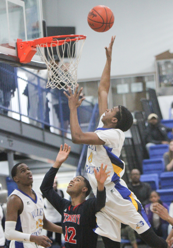 William D. Lewis The Vindicator  VCS Emmanuel Armour(0) goes for 2 past JFK's Byron Taylor(12).