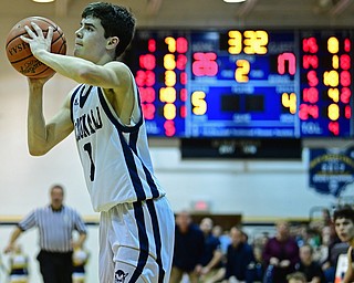 McDONALD, OHIO - FEBRUARY 6, 2018: McDonald's Zach Rasile shots a three point shot, which would bring his career points to 1001, during the first half of their game on Tuesday night at McDonald High School. DAVID DERMER | THE VINDICATOR