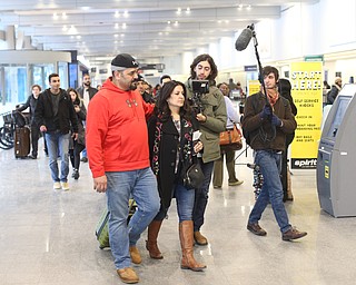 Fidaa Musleh is escorted by her older brother, Ghassan Musleh to the TSA Security Checkpoint, Wednesday, Feb. 7, 2018, at Cleveland Hopkins International Airport in Cleveland. ..(Nikos Frazier | The Vindicator)