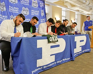  ROBERT K.YOSAY  | THE VINDICATOR..Poland Signing Day.. as 6 players from the class of 2018 head off to college ball..L-R   Nick Sabrin - Dante Ruozzo- Jonah Spencer - Mike Diaz Drew Davies and Cole Lavorini at podium is Brian Banfield......-30-