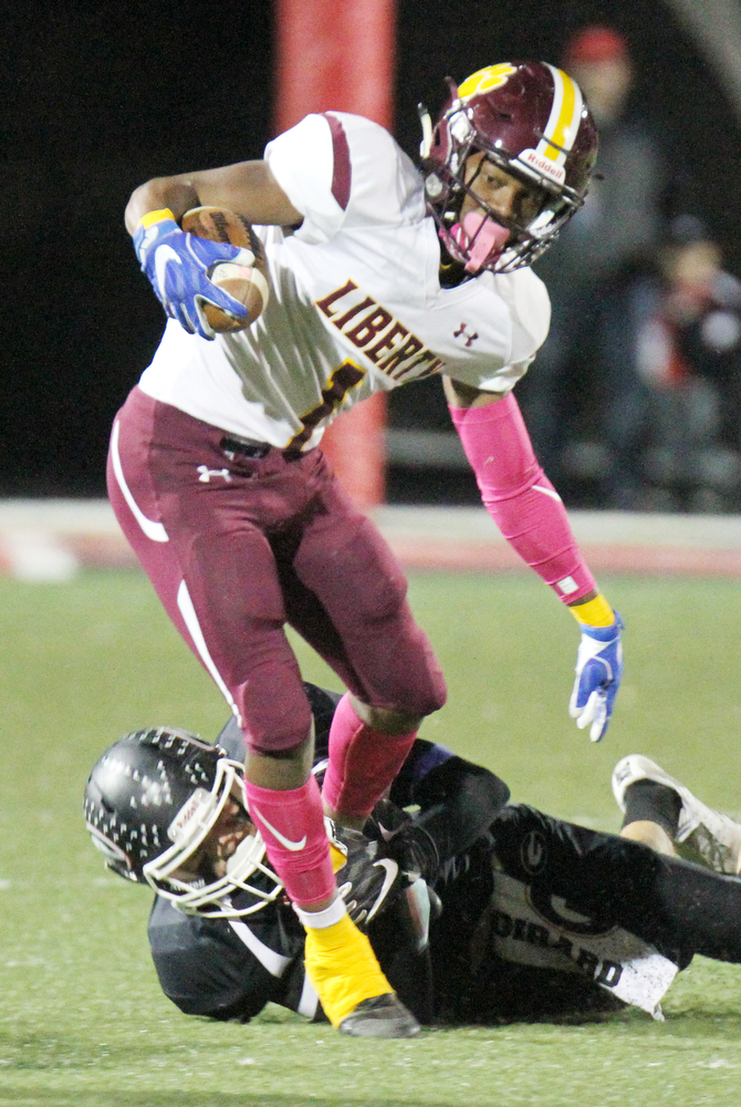 William D. Lewis The Vindicator Liberty's Dra rushton(1) eludes Girard's Michael Belcik(2) during 1rst half action 10272017 in Girard.