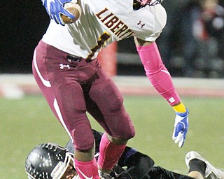 William D. Lewis The Vindicator Liberty's Dra rushton(1) eludes Girard's Michael Belcik(2) during 1rst half action 10272017 in Girard.