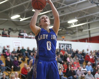 Jackson-Milton guard Grace McDevitt (0) goes up for two under the net in the first quarter of an OHSAA high school basketball game, Thursday, Feb. 8, 2018, in Columbiana. Columbiana won 36-23...(Nikos Frazier | The Vindicator)