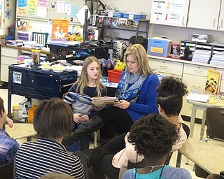 Neighbors | Zack Shively.Austintown Intermediate School celebrated World Read Aloud Day on Feb. 1. LitWorld created the international reading campaign to raise awareness of literacy rates around the world. Pictured, Shannon Patrick and her daughter Danika Patrick read the "You Read to Me, I'll Read to You" story "I Hate My Hat."