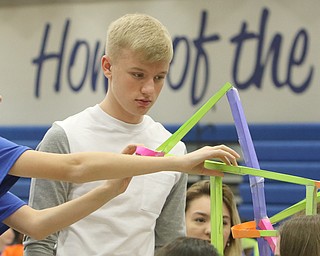  ROBERT K.YOSAY  | THE VINDICATOR..making the marble paper roller coasters - Isaiah Vennetti and Chris Black both 9th graders..A few hundred Hubbard High School students spent Friday at the schoolÕs STEM Festival where they put their creativity and STEM knowledge to the test. Students could choose to participate in contests including bridge building, creating and testing a trebuchet and an egg drop...-30-