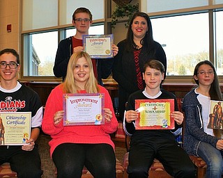 Girard Junior High School recently awarded five students of the month at a board of education meeting. Above, seated from left, are Jordon Streamo, Jaelyn Marraffa, Gus Johnson and Jazmin Jones. Standing, from left, are David Barnes and Jennifer Santangelo, principal.