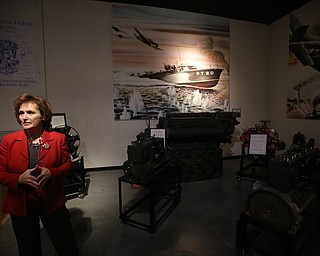 Executive Director Mary Ann Porinchak talks about the PT Boat engines, Wednesday, Jan. 24, 2018, at the Packard Museum in Warren...(Nikos Frazier | The Vindicator)