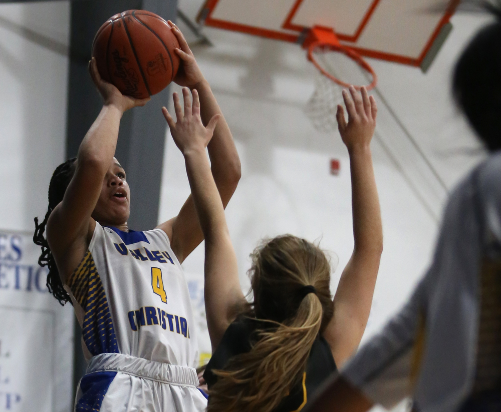 Valley Christian's Kristen Gill (4) goes up for two in the third quarter of an OHSAA high school basketball game, Saturday, Feb. 10, 2018, in Youngstown. Garfield won 64-58...(Nikos Frazier | The Vindicator)