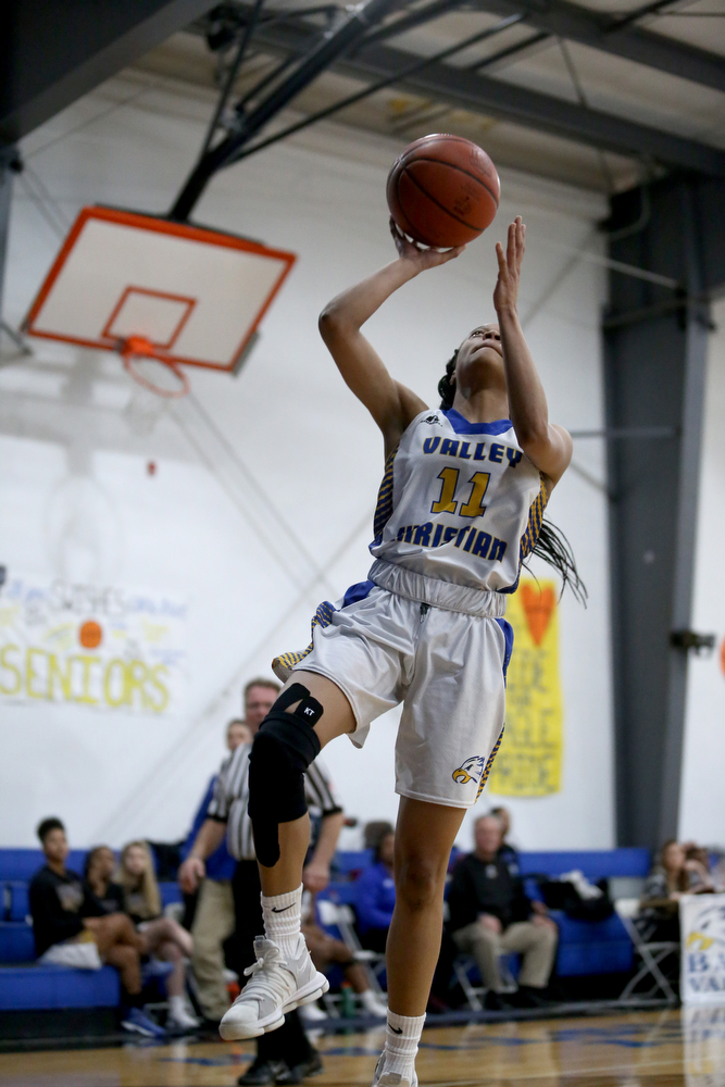 Valley Christian's Imane Snyder (11) goes up for a breakaway layup in the fourth quarter of an OHSAA high school basketball game, Saturday, Feb. 10, 2018, in Youngstown. Garfield won 64-58...(Nikos Frazier | The Vindicator)