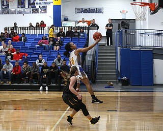 Valley Christian's Kristen Gill (4) goes up for a layup in the fourth quarter of an OHSAA high school basketball game, Saturday, Feb. 10, 2018, in Youngstown. Garfield won 64-58...(Nikos Frazier | The Vindicator)