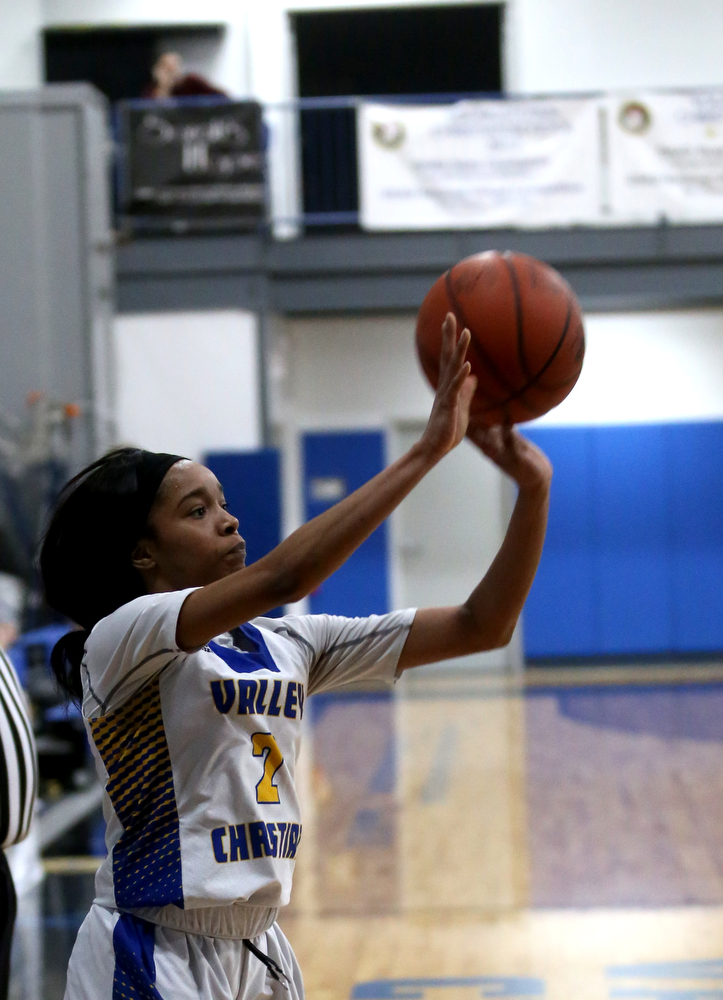 Valley Christian's India Snyder (2) goes up for three in the fourth quarter of an OHSAA high school basketball game, Saturday, Feb. 10, 2018, in Youngstown. Garfield won 64-58...(Nikos Frazier | The Vindicator)