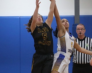 Valley Christian's Kristen Gill (4) and Garfield's Grace Mills (5) go up for the rebound in the fourth quarter of an OHSAA high school basketball game, Saturday, Feb. 10, 2018, in Youngstown. Garfield won 64-58...(Nikos Frazier | The Vindicator)