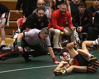 Claymont 113 pound wrestler Jarrett Warrington pins Canfield 113 pound wrestler Ronald Angelilli in the quarter finals of the OHSAA State Wrestling Dual Team Tournament, Sunday, Feb. 11, 2018, at Ohio State University's St. John Arena in Columbus...(Nikos Frazier | The Vindicator)