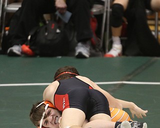 Canfield 126 pound wrestler McCoy Watkins Burcsak gets a hold on Claymont 126 pound wrestler Seth Ferguson in the quarter finals of the OHSAA State Wrestling Dual Team Tournament, Sunday, Feb. 11, 2018, at Ohio State University's St. John Arena in Columbus...(Nikos Frazier | The Vindicator)