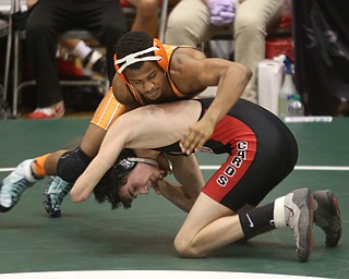 Claymont 132 pound wrestler Jerome Tucker moves around Canfield 132 pound wrestler Aidan Burcsak in the quarter finals of the OHSAA State Wrestling Dual Team Tournament, Sunday, Feb. 11, 2018, at Ohio State University's St. John Arena in Columbus...(Nikos Frazier | The Vindicator)