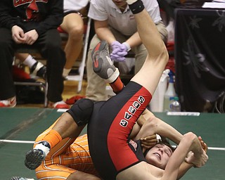 Claymont 132 pound wrestler Jerome Tucker flips over Canfield 132 pound wrestler Aidan Burcsak in the quarter finals of the OHSAA State Wrestling Dual Team Tournament, Sunday, Feb. 11, 2018, at Ohio State University's St. John Arena in Columbus...(Nikos Frazier | The Vindicator)