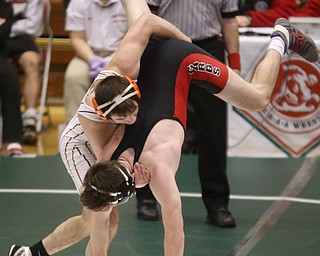 Claymont 138 pound wrestler Maxx Peters flips over Canfield 138 pound wrestler Giovanni Dunlap in the quarter finals of the OHSAA State Wrestling Dual Team Tournament, Sunday, Feb. 11, 2018, at Ohio State University's St. John Arena in Columbus...(Nikos Frazier | The Vindicator)