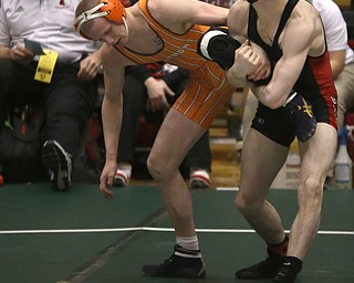 Canfield 152 pound wrestler David Reinhart grabs a hold of Claymont 152 pound wrestler Briar Cadle's leg in the quarter finals of the OHSAA State Wrestling Dual Team Tournament, Sunday, Feb. 11, 2018, at Ohio State University's St. John Arena in Columbus...(Nikos Frazier | The Vindicator)