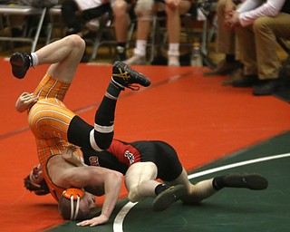 Canfield 152 pound wrestler David Reinhart flips Claymont 152 pound wrestler Briar Cadle out of bounds in the quarter finals of the OHSAA State Wrestling Dual Team Tournament, Sunday, Feb. 11, 2018, at Ohio State University's St. John Arena in Columbus...(Nikos Frazier | The Vindicator)