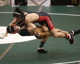 Canfield 160 pound wrestler Ben Cutrer is brought down by Claymont 160 pound wrestler Kaden Bunting in the quarter finals of the OHSAA State Wrestling Dual Team Tournament, Sunday, Feb. 11, 2018, at Ohio State University's St. John Arena in Columbus...(Nikos Frazier | The Vindicator)