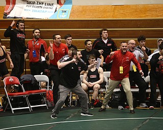 The Canfield bench reacts to Ben Cutrer's pin in the quarter finals of the OHSAA State Wrestling Dual Team Tournament, Sunday, Feb. 11, 2018, at Ohio State University's St. John Arena in Columbus...(Nikos Frazier | The Vindicator)