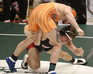 Canfield 170 pound wrestler Anthony D'Alesio attempts to bring down Claymont 170 pound wrestler Ashton Eyler in the quarter finals of the OHSAA State Wrestling Dual Team Tournament, Sunday, Feb. 11, 2018, at Ohio State University's St. John Arena in Columbus...(Nikos Frazier | The Vindicator)