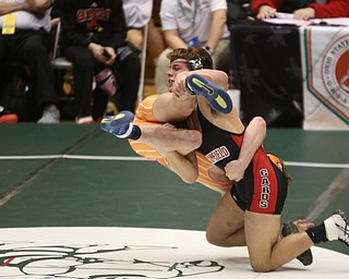 Canfield 170 pound wrestler Anthony D'Alesio attempts to bring down Claymont 170 pound wrestler Ashton Eyler in the quarter finals of the OHSAA State Wrestling Dual Team Tournament, Sunday, Feb. 11, 2018, at Ohio State University's St. John Arena in Columbus...(Nikos Frazier | The Vindicator)