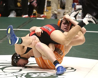 Canfield 170 pound wrestler Anthony D'Alesio and Claymont 170 pound wrestler Ashton Eyler hold onto each other in the quarter finals of the OHSAA State Wrestling Dual Team Tournament, Sunday, Feb. 11, 2018, at Ohio State University's St. John Arena in Columbus...(Nikos Frazier | The Vindicator)