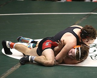 Canfield 195 pound wrestler Nick Crawford attempts a pin on Claymont 195 pound wrestler Blake Linard in the quarter finals of the OHSAA State Wrestling Dual Team Tournament, Sunday, Feb. 11, 2018, at Ohio State University's St. John Arena in Columbus...(Nikos Frazier | The Vindicator)