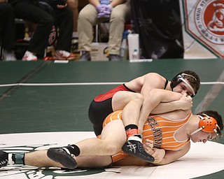 Canfield 220 pound wrestler Tyler Stein holds onto Claymont 220 pound wrestler Kole Aubiel in the quarter finals of the OHSAA State Wrestling Dual Team Tournament, Sunday, Feb. 11, 2018, at Ohio State University's St. John Arena in Columbus...(Nikos Frazier | The Vindicator)