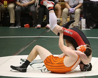 Canfield 285 pound wrestler Daniel Kapalko is flipped over by Claymont 285 pound wrestler Lyle Clark in the quarter finals of the OHSAA State Wrestling Dual Team Tournament, Sunday, Feb. 11, 2018, at Ohio State University's St. John Arena in Columbus...(Nikos Frazier | The Vindicator)