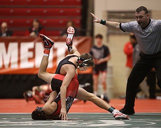 Canfield 106 pound wrestler Ethan Fletcher flips around to gain a better grip on Wauseon 106 pound wrestler Damon Molina in the semi finals of the OHSAA State Wrestling Dual Team Tournament, Sunday, Feb. 11, 2018, at Ohio State University's St. John Arena in Columbus...(Nikos Frazier | The Vindicator)